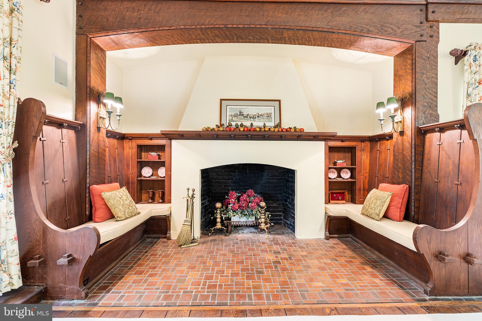 479 Cassatt Road Berwyn, PA 19312 - Photo 11 of 59 fireplace with warming benches and carved wood
