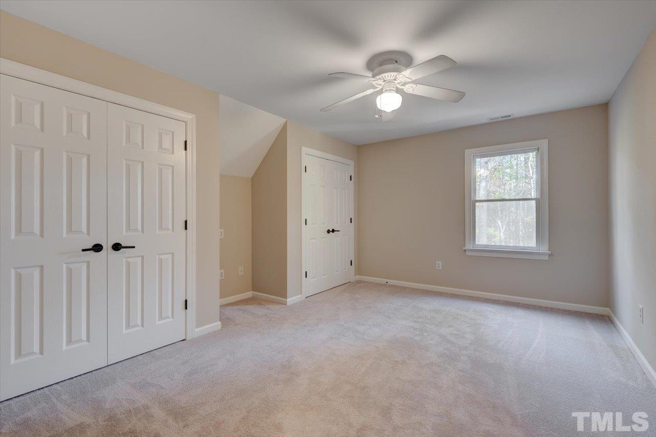 7708 Pinecrest Road Raleigh, NC 27613 - Photo 22 of 29 a view of an empty room with a window