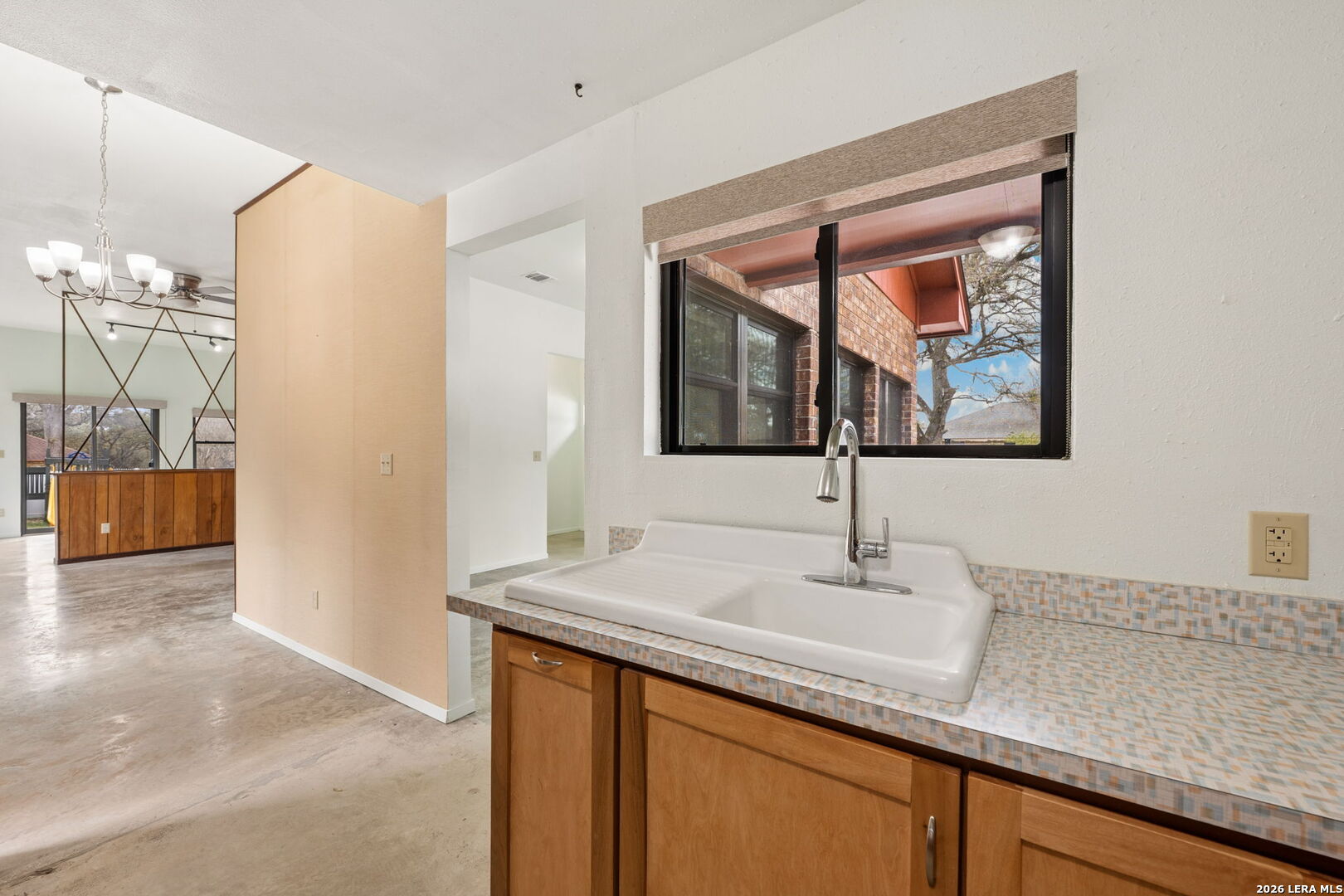 9616 Azalea Circle Garden Ridge, TX 78266 - Photo 19 of 47 a bathroom with a sink and a mirror