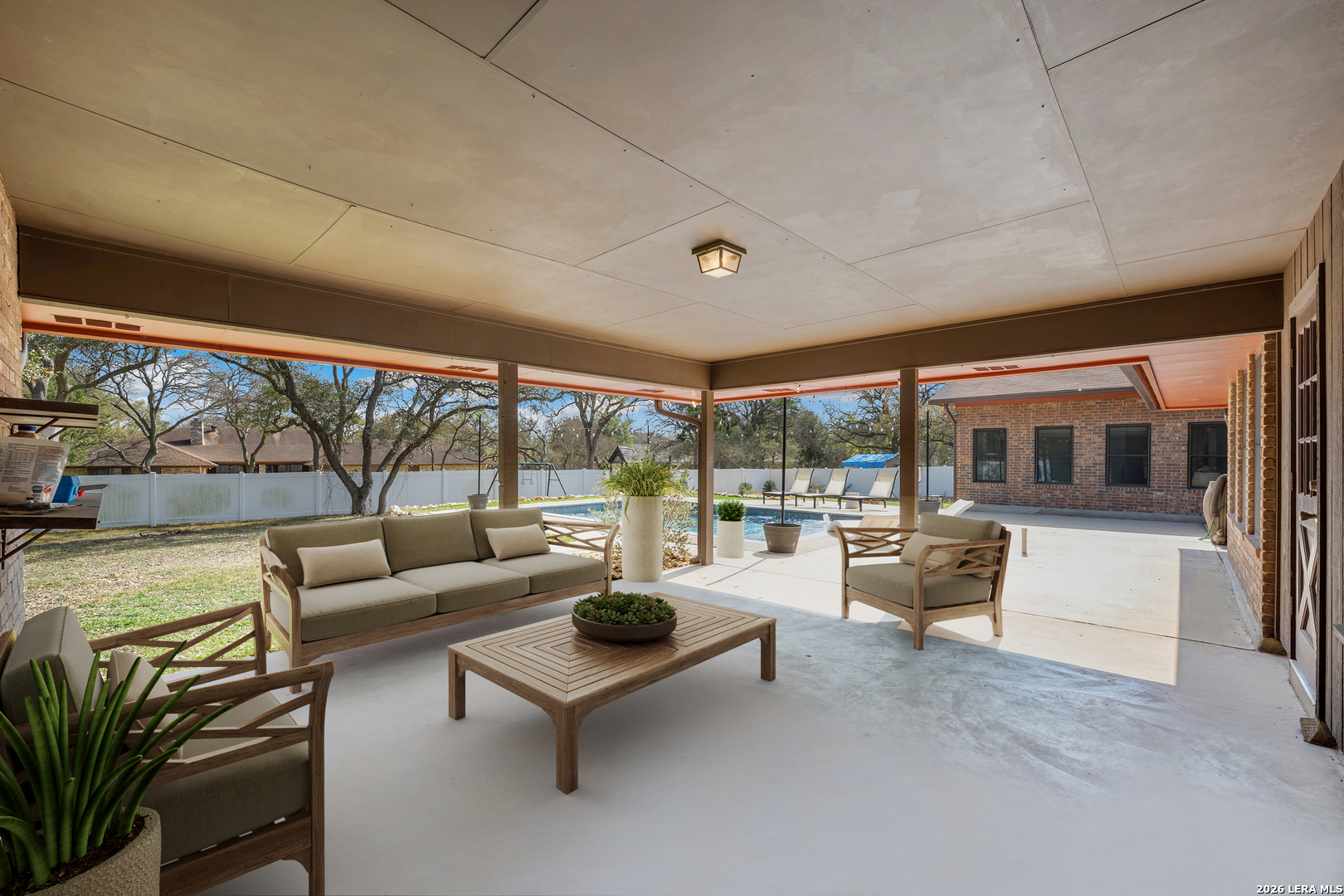 9616 Azalea Circle Garden Ridge, TX 78266 - Photo 2 of 47 a living room with furniture and a large window
