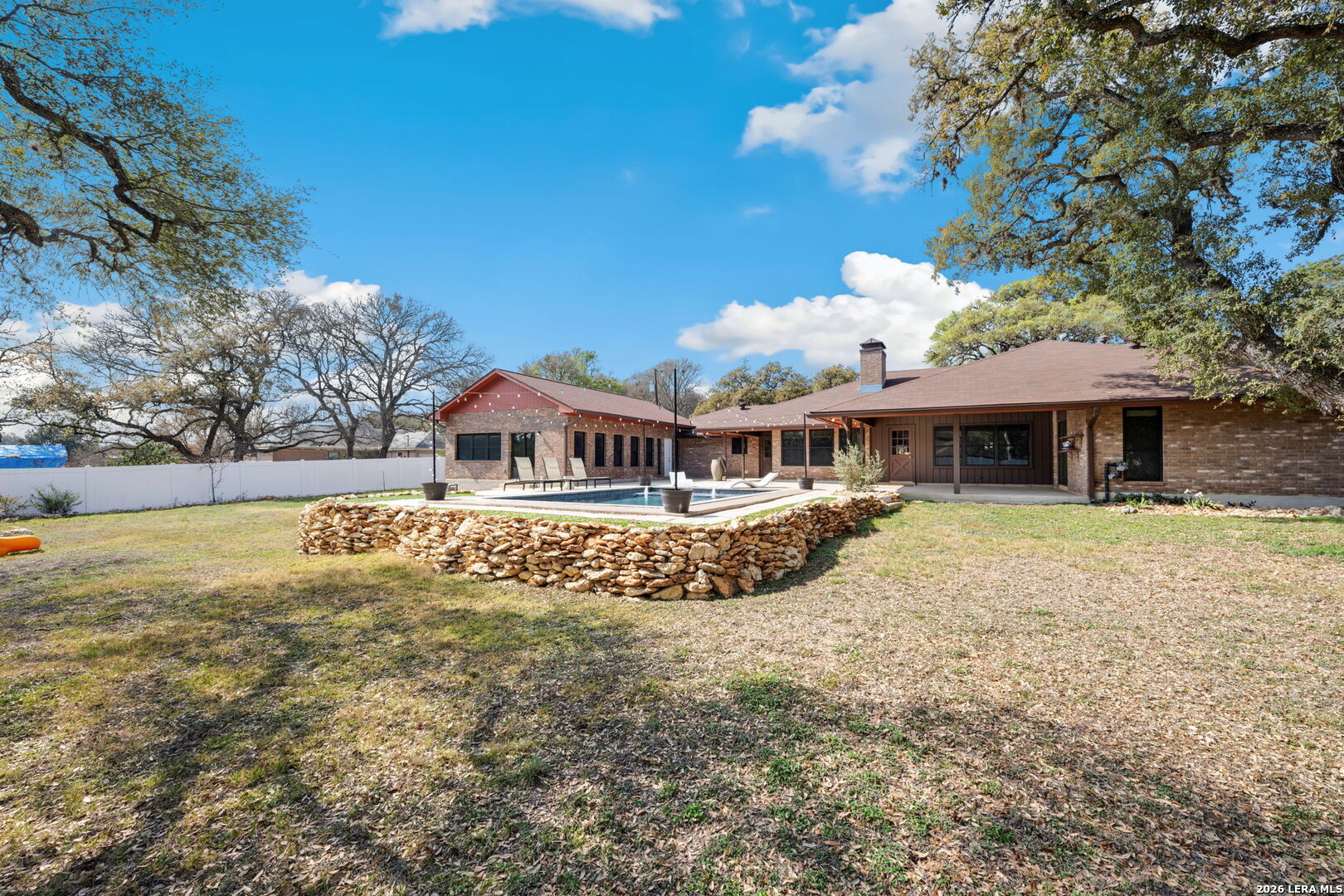 9616 Azalea Circle Garden Ridge, TX 78266 - Photo 28 of 47 a front view of a house with a yard