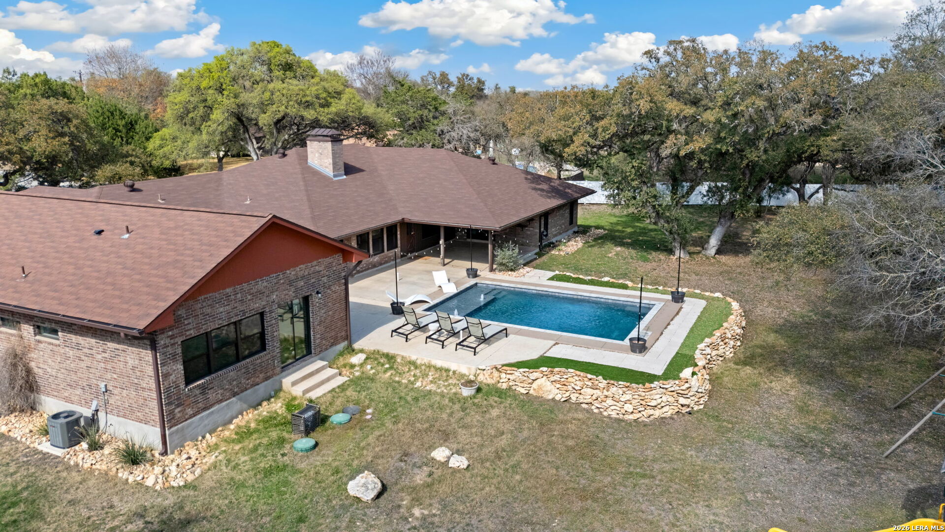 9616 Azalea Circle Garden Ridge, TX 78266 - Photo 29 of 47 a view of a patio with table and chairs with wooden floor and fence