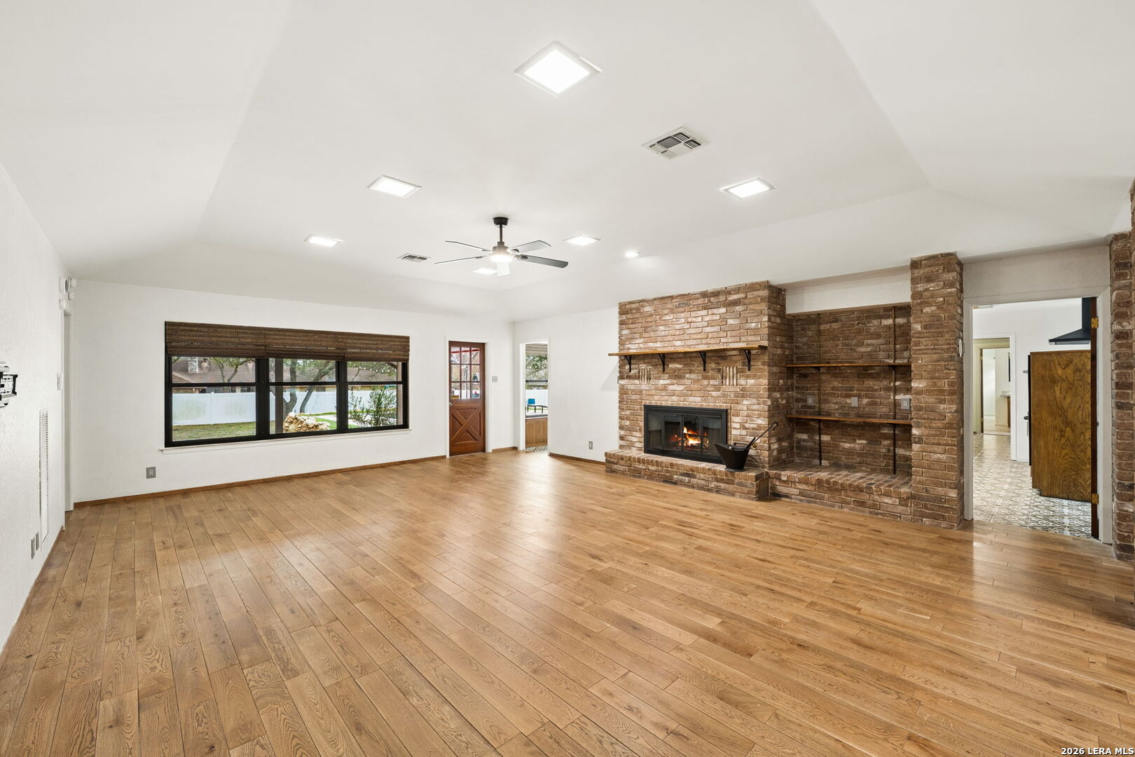 9616 Azalea Circle Garden Ridge, TX 78266 - Photo 38 of 47 a view of a livingroom with a fireplace and window