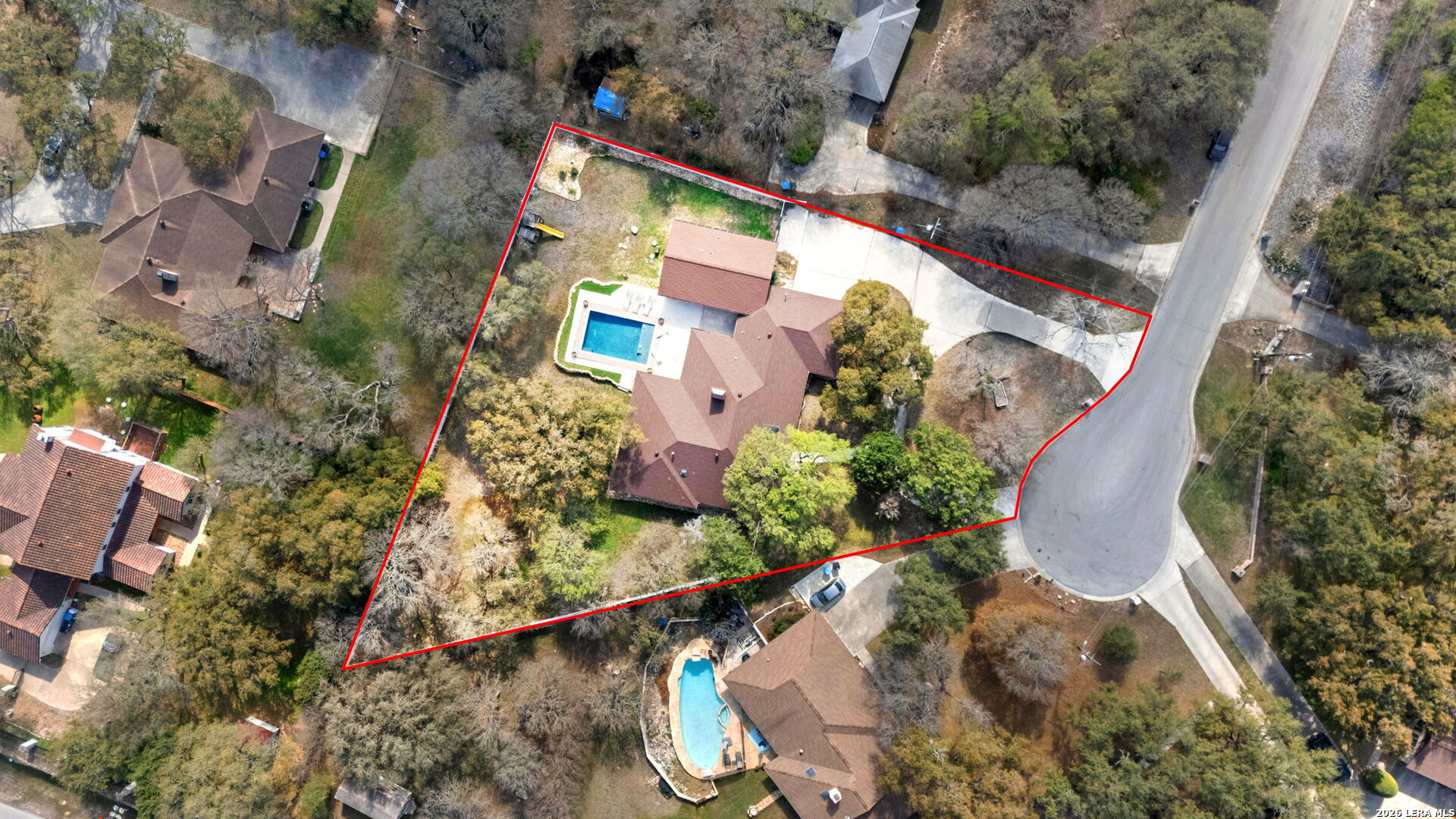 9616 Azalea Circle Garden Ridge, TX 78266 - Photo 4 of 47 an aerial view of house with yard swimming pool and outdoor seating