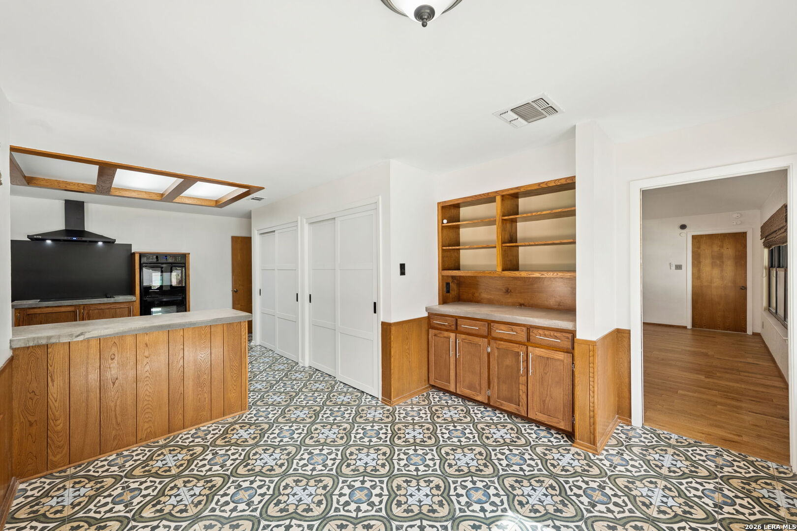 9616 Azalea Circle Garden Ridge, TX 78266 - Photo 42 of 47 a large kitchen with a stove and a refrigerator