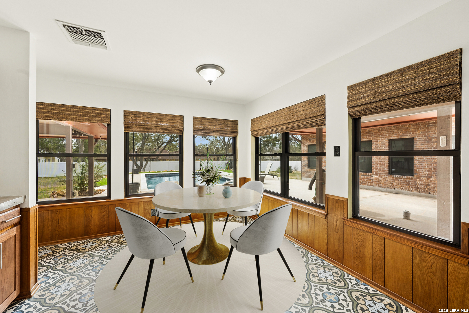 9616 Azalea Circle Garden Ridge, TX 78266 - Photo 43 of 47 a view of a dining room with furniture window and wooden floor