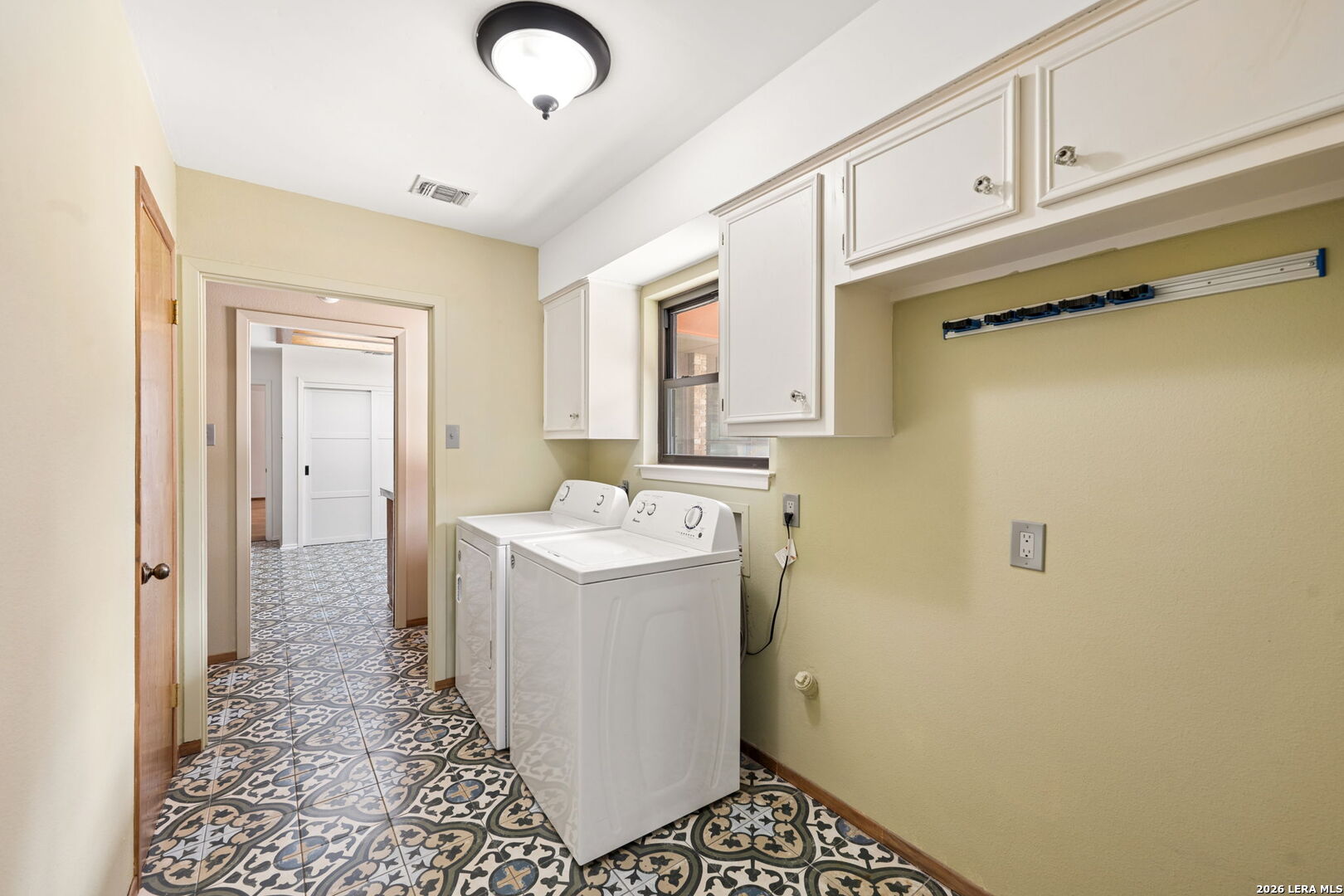 9616 Azalea Circle Garden Ridge, TX 78266 - Photo 45 of 47 a utility room with a sink