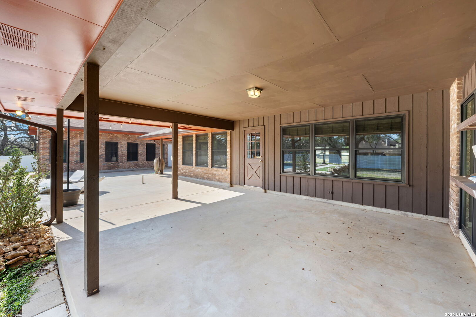 9616 Azalea Circle Garden Ridge, TX 78266 - Photo 46 of 47 a view of a building with a porch