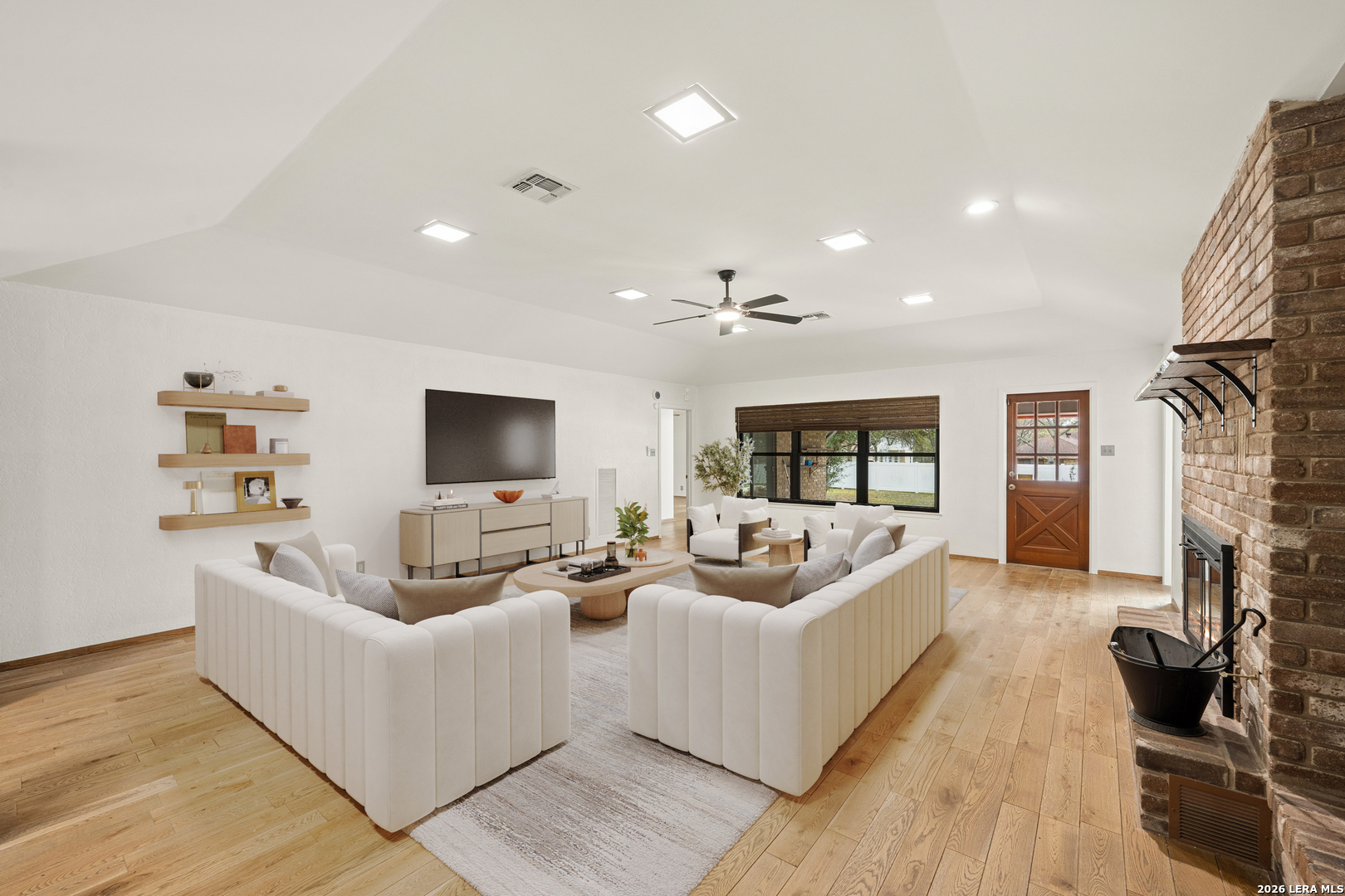 9616 Azalea Circle Garden Ridge, TX 78266 - Photo 8 of 47 a living room with furniture and a flat screen tv
