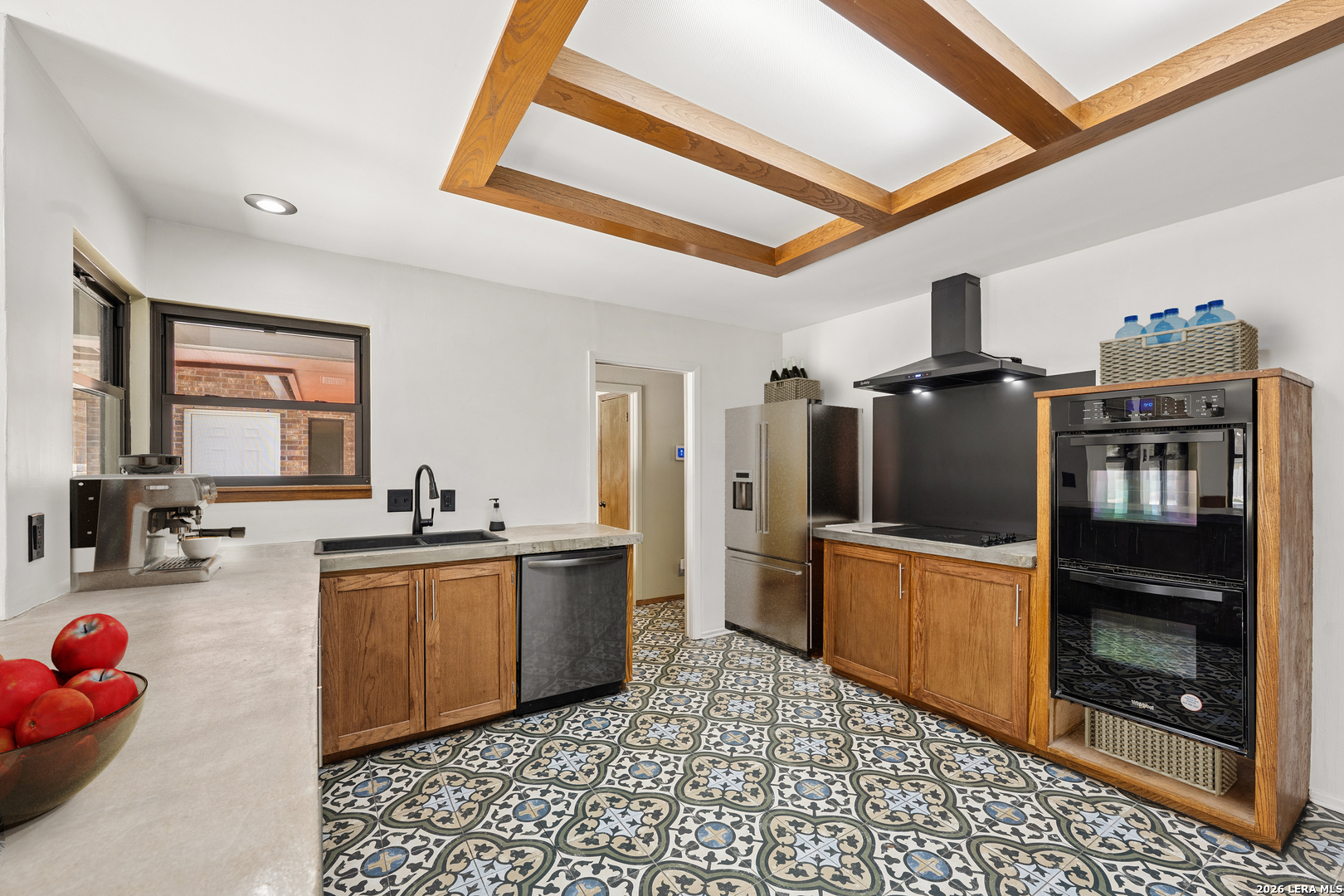 9616 Azalea Circle Garden Ridge, TX 78266 - Photo 10 of 47 a kitchen with stainless steel appliances a stove a refrigerator and a sink
