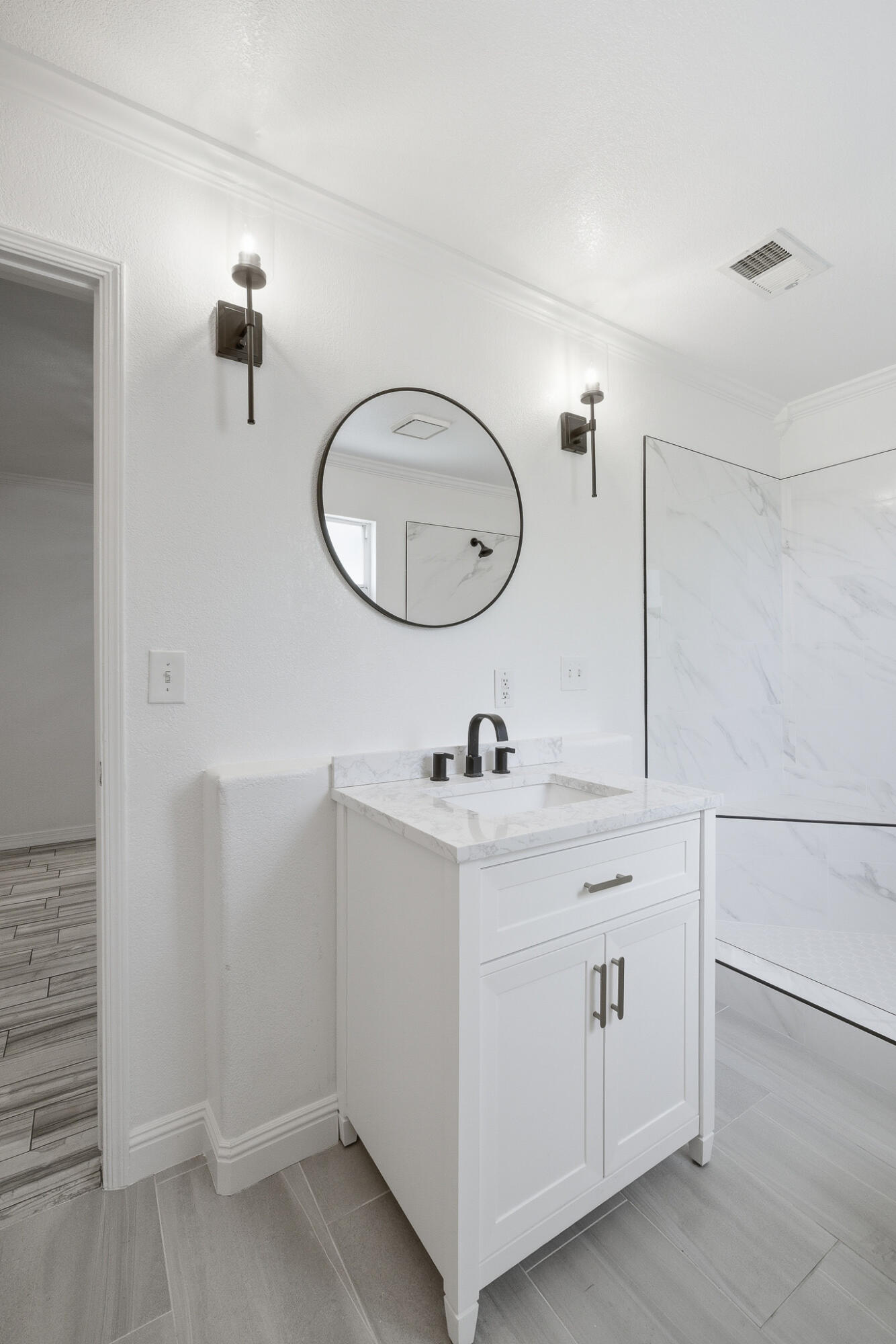 618 Birdsong Court Exeter, CA 93221 - Photo 39 of 62 a bathroom with a sink and mirror