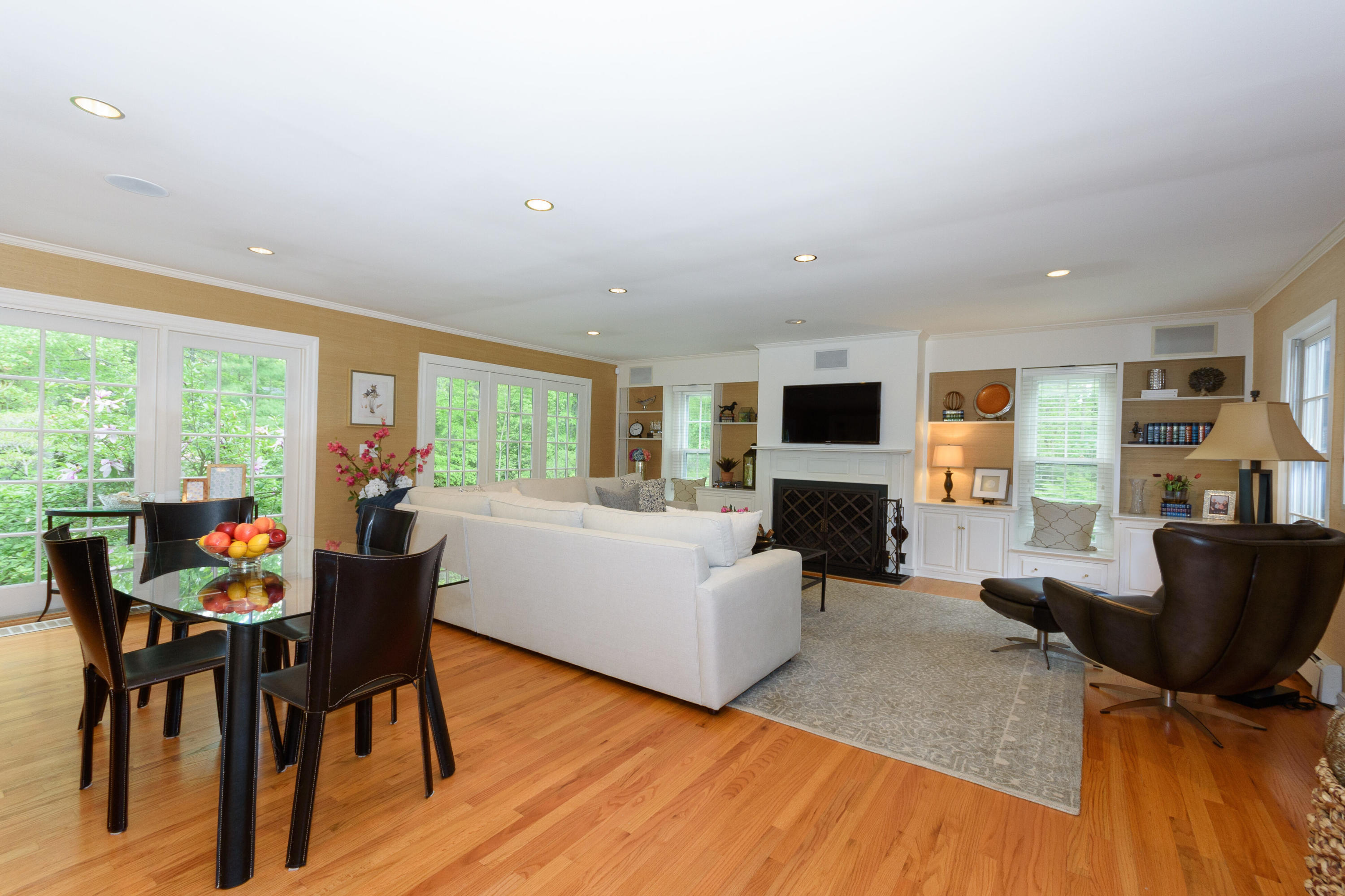 116 Ridge Acres Road Darien, CT 06820 - Photo 13 of 44 a living room with fireplace furniture and a flat screen tv