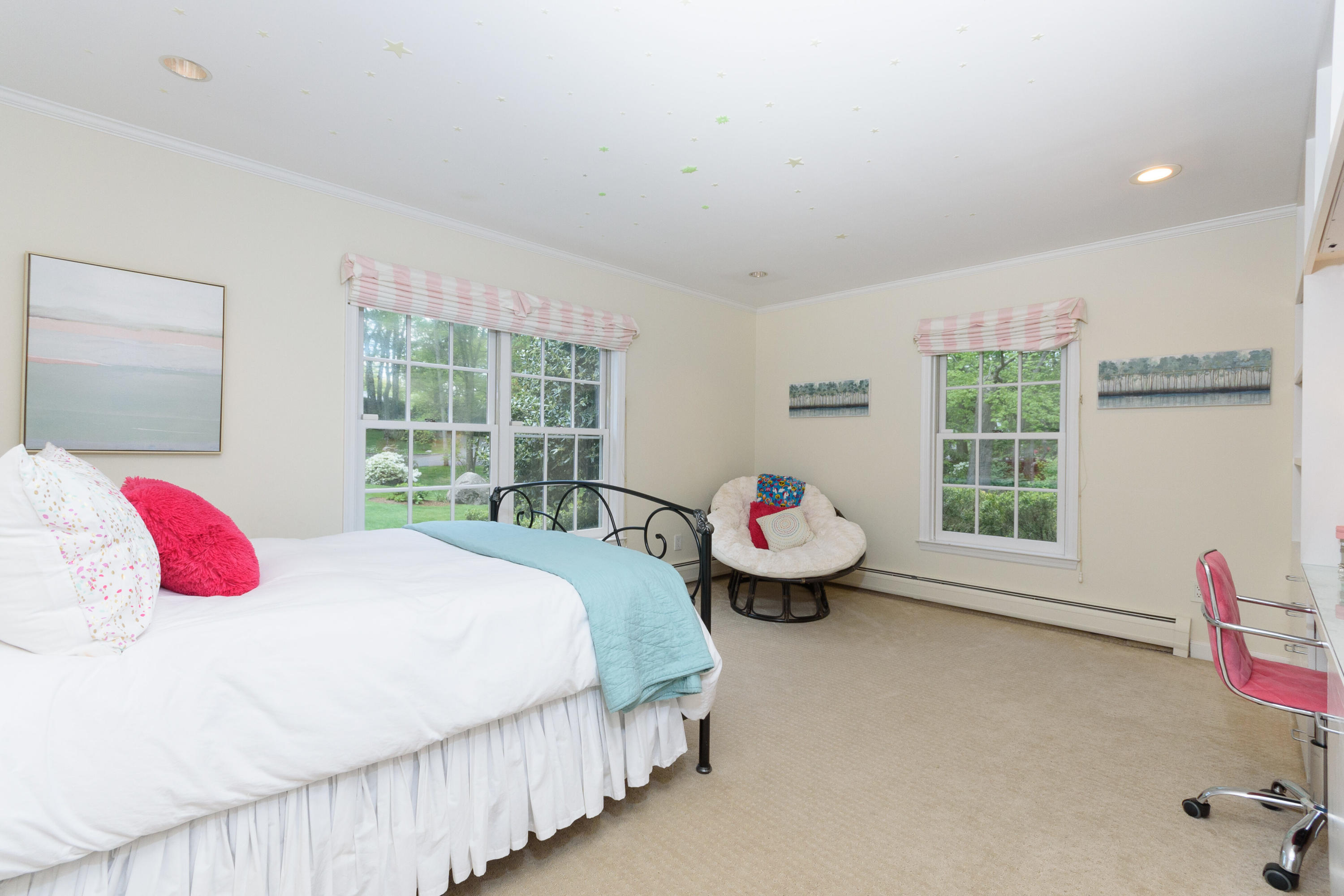 116 Ridge Acres Road Darien, CT 06820 - Photo 23 of 44 a bedroom with a bed and a large window