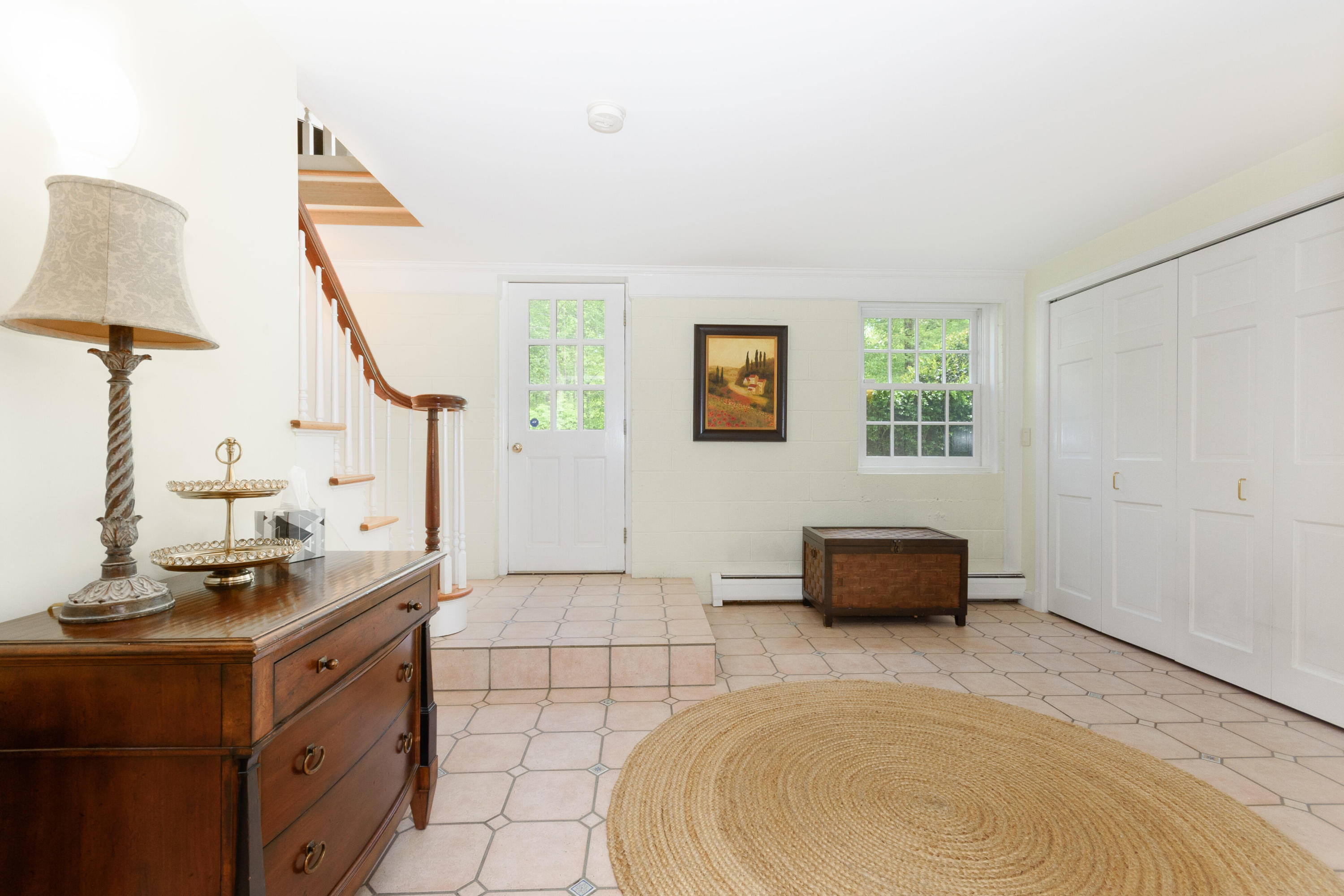 116 Ridge Acres Road Darien, CT 06820 - Photo 27 of 44 a bedroom with a bed a couch and a window