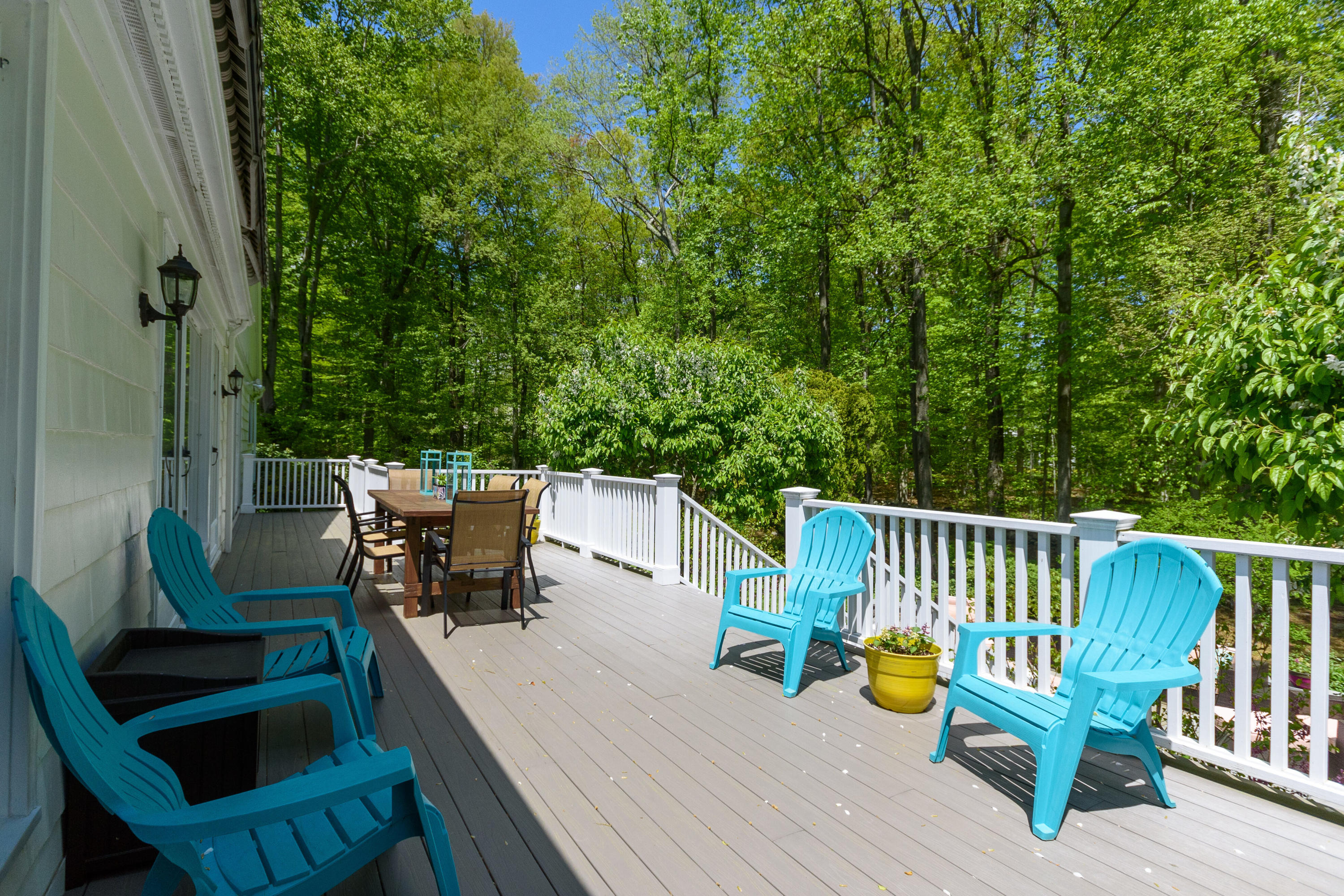 116 Ridge Acres Road Darien, CT 06820 - Photo 36 of 44 a view of a patio with a table and chairs