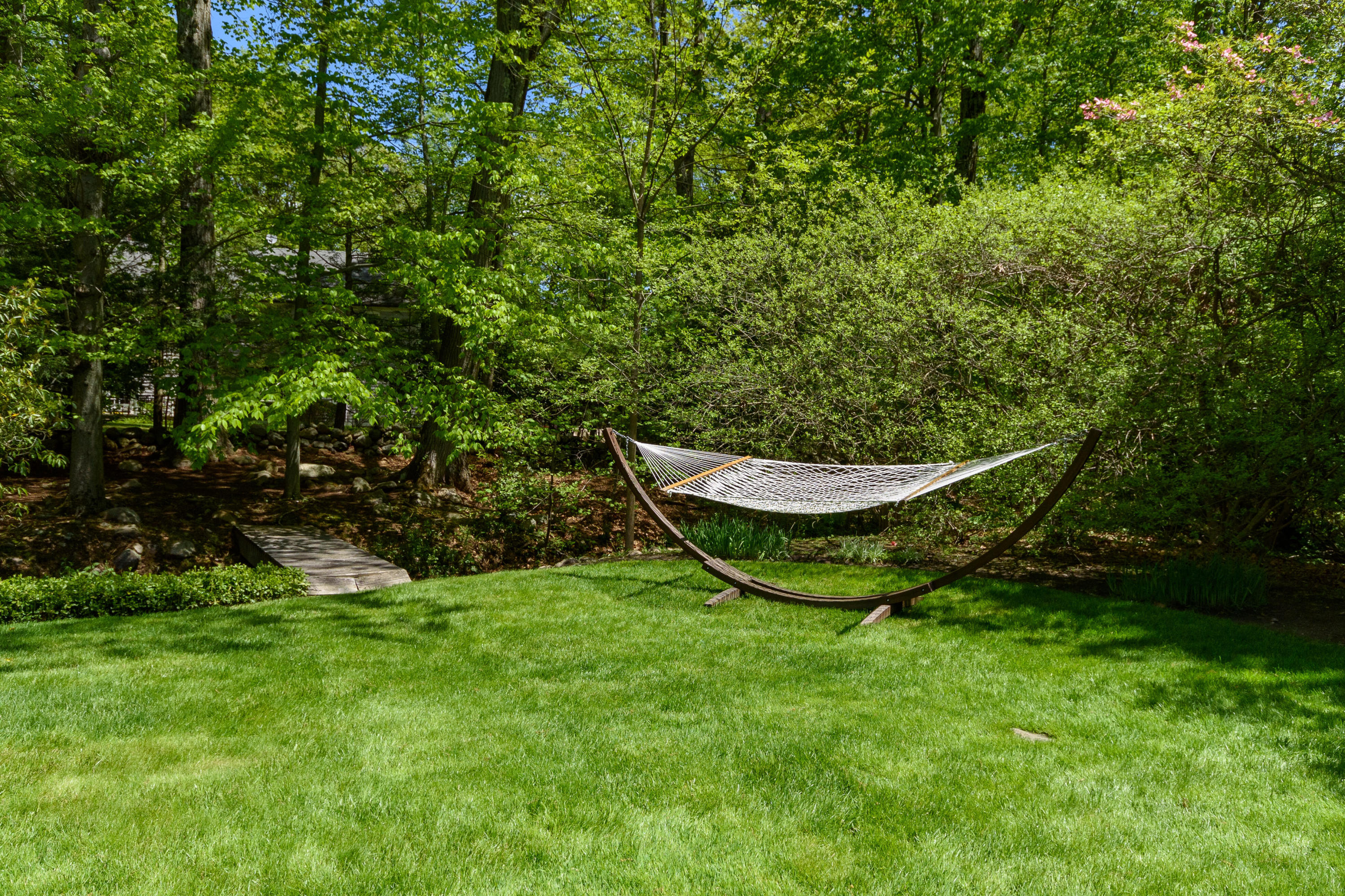 116 Ridge Acres Road Darien, CT 06820 - Photo 42 of 44 a view of a backyard with swimming pool
