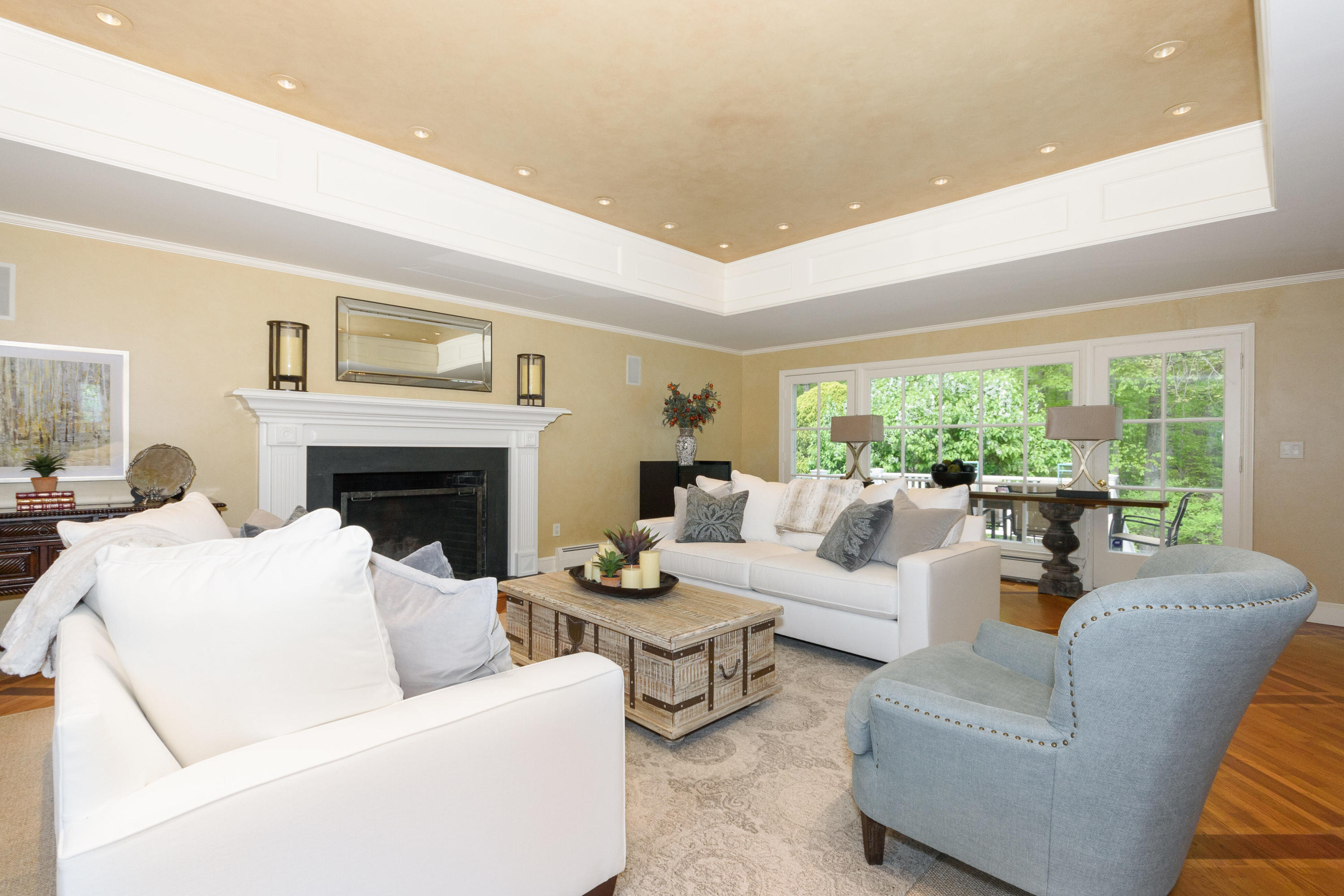 116 Ridge Acres Road Darien, CT 06820 - Photo 7 of 44 a living room with furniture fireplace and a large window