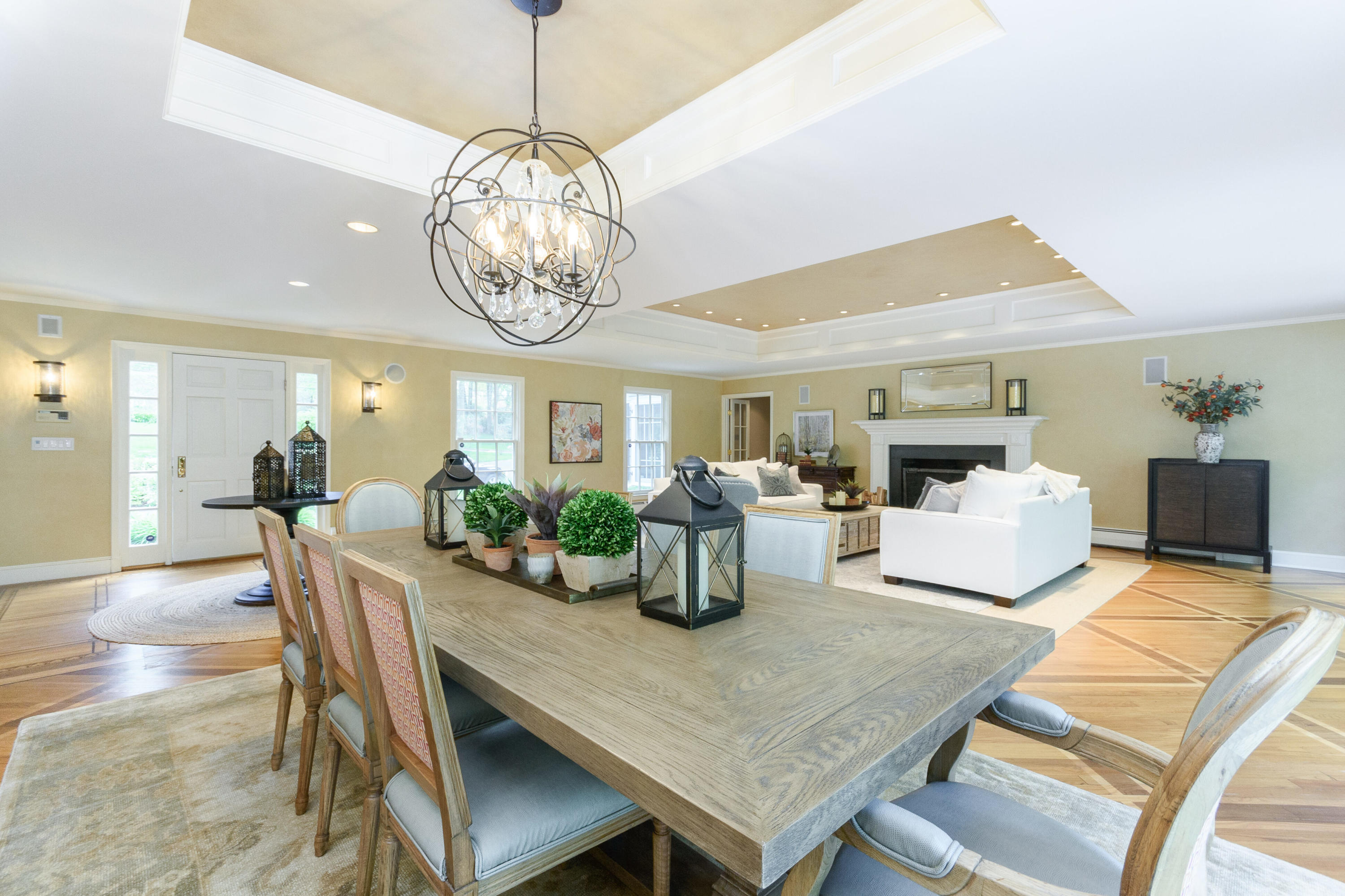 116 Ridge Acres Road Darien, CT 06820 - Photo 8 of 44 a view of a dining room with furniture a chandelier and wooden floor