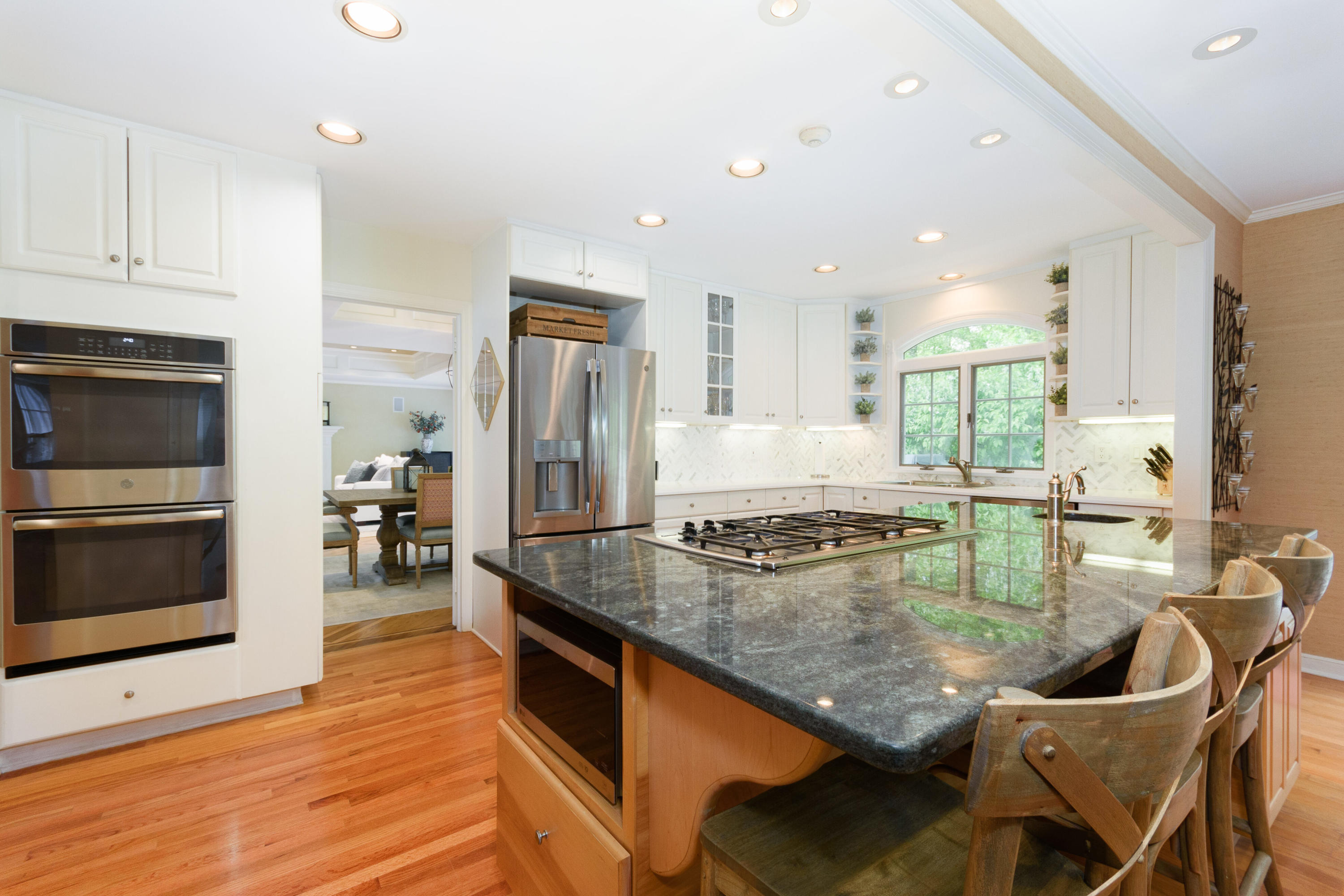 116 Ridge Acres Road Darien, CT 06820 - Photo 9 of 44 a kitchen with stainless steel appliances granite countertop a stove and a refrigerator