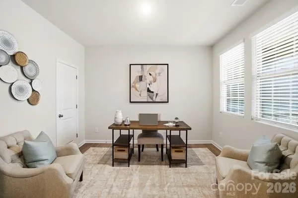 a workspace with furniture and window