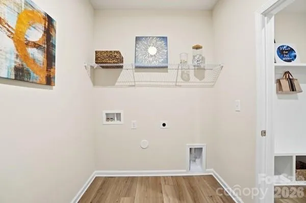 a bedroom with bed and a window