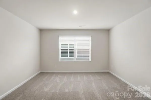 a bathroom with a sink toilet vanity and shower