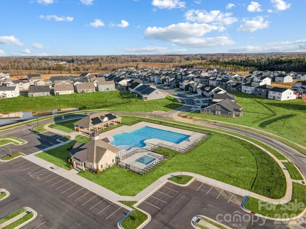 a view of a swimming pool and outdoor space