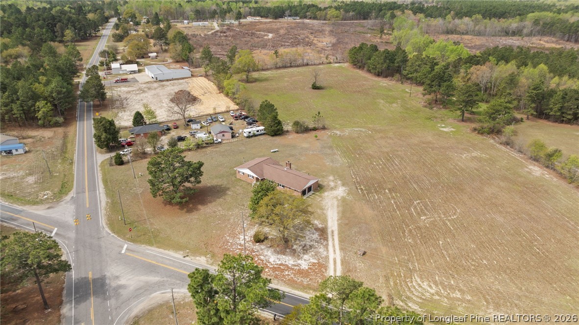 2890 Fulford McMillan Road Raeford, NC 28376 - Photo 37 of 37 an aerial view of a residential houses with outdoor space