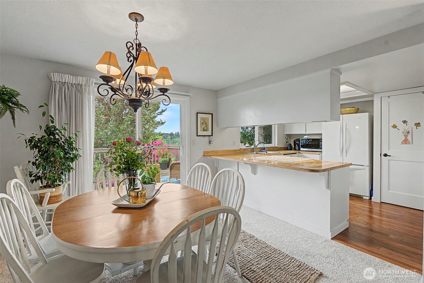 1611 Ham Hill Road Centralia, WA 98531 - Photo 10 of 40 a dining room filled chandelier and wooden floor