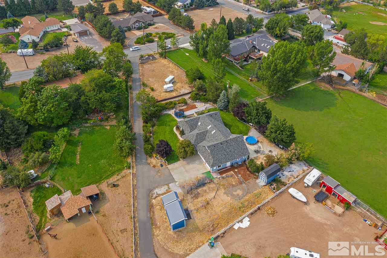 13040 Valley Springs Road Reno, NV 89511 - Photo 6 of 39 an aerial view of residential houses with outdoor space