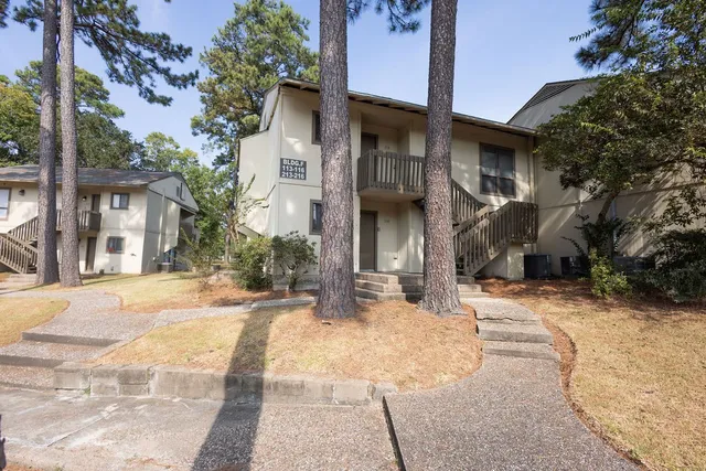 a view of a building with a street