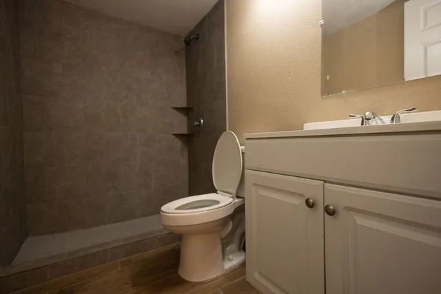 a bathroom with a sink and toilet