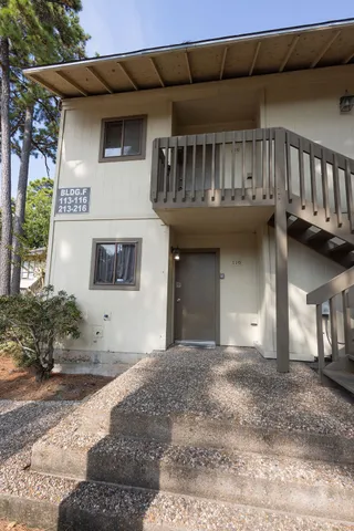 a front view of a house with a garage