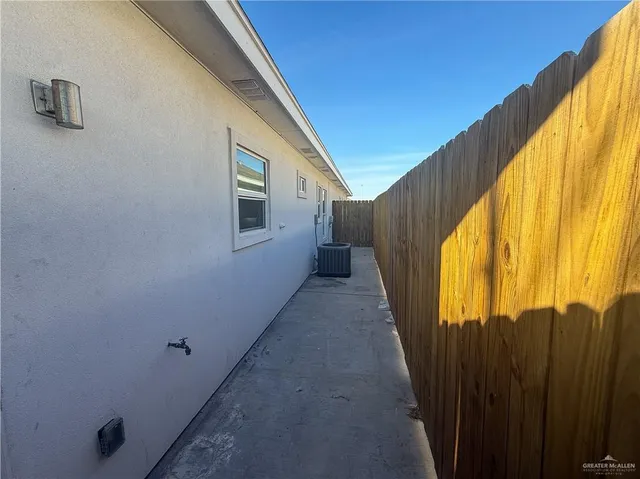a view of a house with wooden stairs