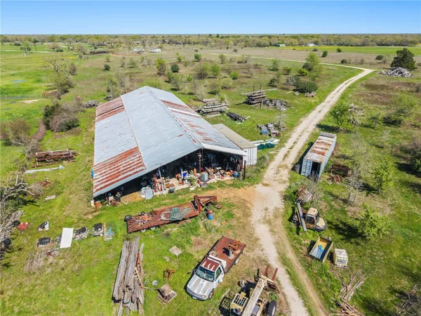 an aerial view of a house with a outdoor space