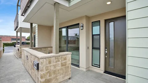 a view of balcony with stainless steel appliances