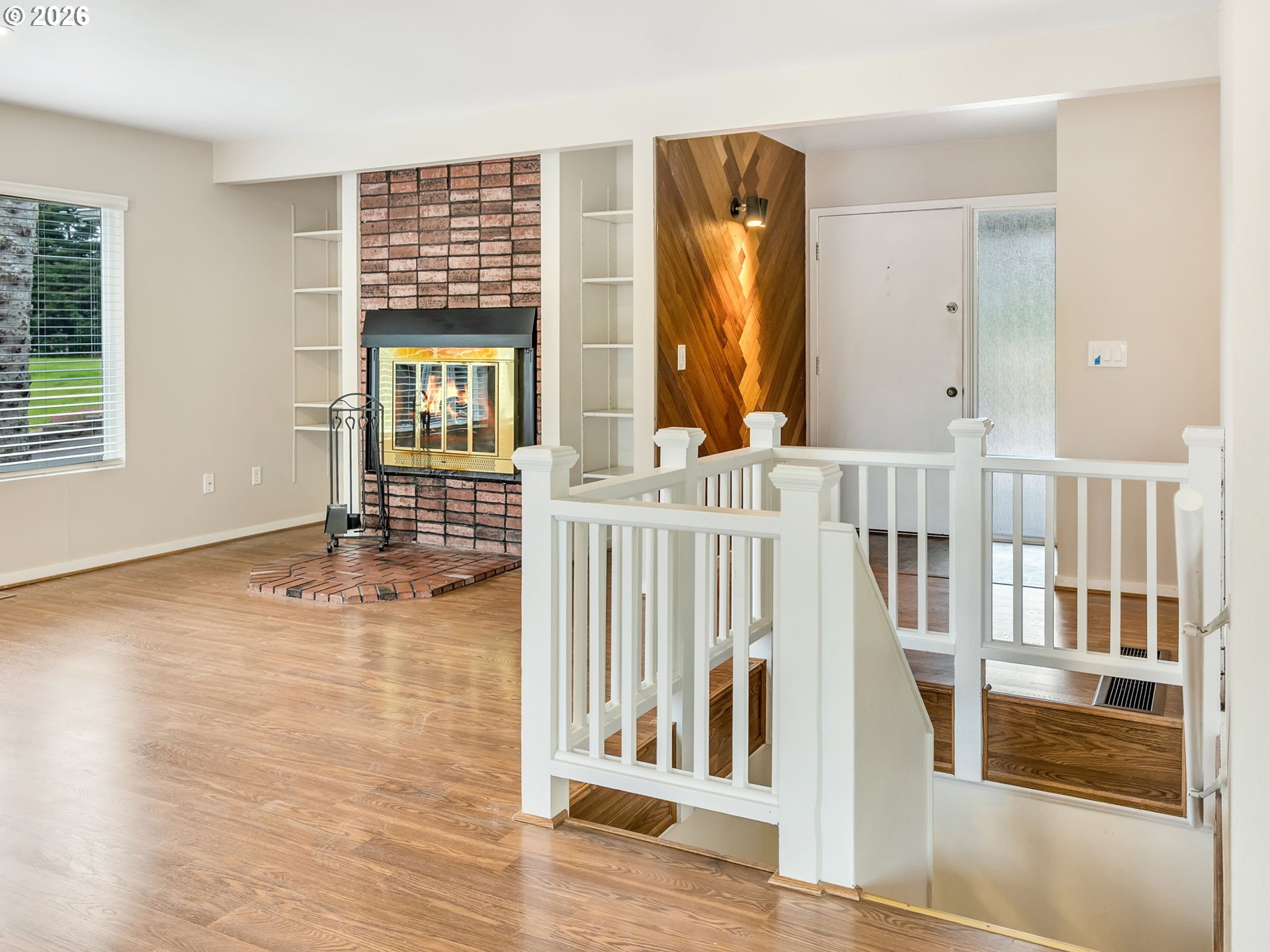 91923 Ridge Road Warrenton, OR 97146 - Photo 3 of 35 a view of an entryway with wooden floor