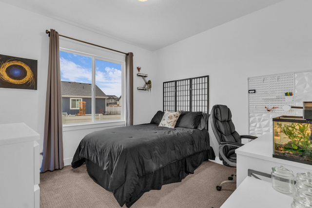 2454 West Jackson Street Mapleton, UT 84664 - Photo 26 of 63 Bedroom featuring light carpet and an office area