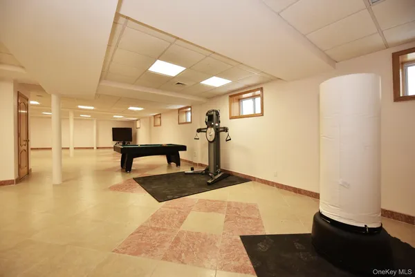 a bathroom with a sink toilet and mirror