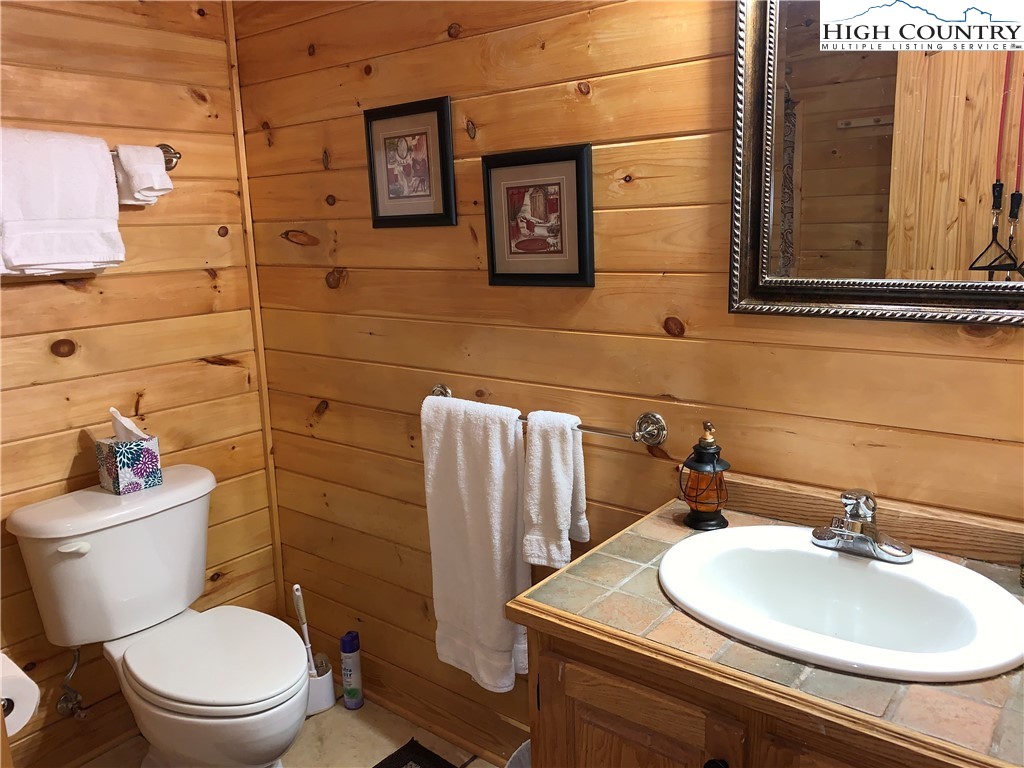 447 South Turkey Ridge Crumpler, NC 28617 - Photo 28 of 39 a bathroom with a sink toilet and shower