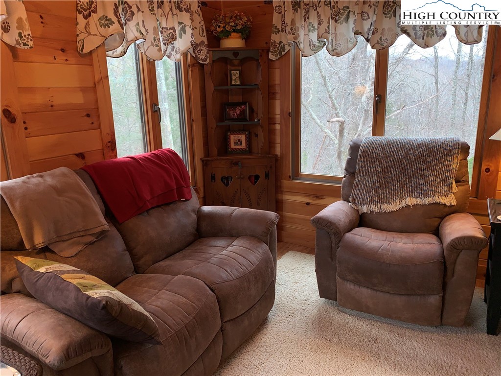 447 South Turkey Ridge Crumpler, NC 28617 - Photo 8 of 39 a living room with furniture and a window