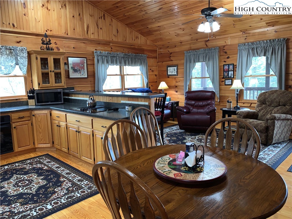 447 South Turkey Ridge Crumpler, NC 28617 - Photo 10 of 39 a living room with furniture and a fireplace