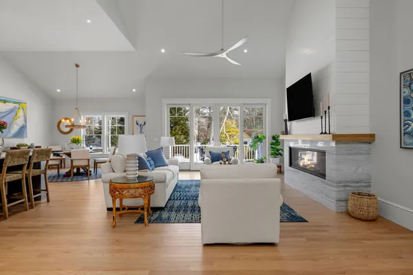 a kitchen with stainless steel appliances granite countertop a sink dishwasher stove and refrigerator