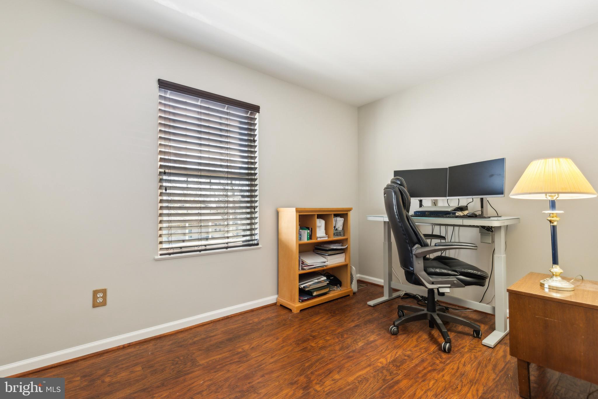 20752 Cross Timber Drive Ashburn, VA 20147 - Photo 31 of 39 a view of a workspace with furniture and a window
