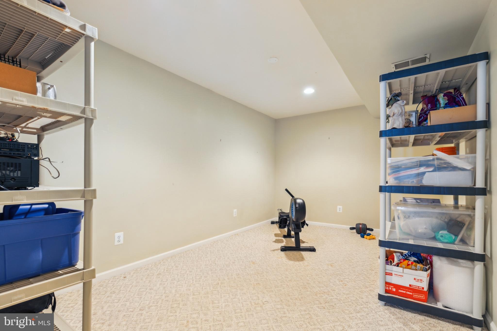 20752 Cross Timber Drive Ashburn, VA 20147 - Photo 34 of 39 a view of a room with shelves