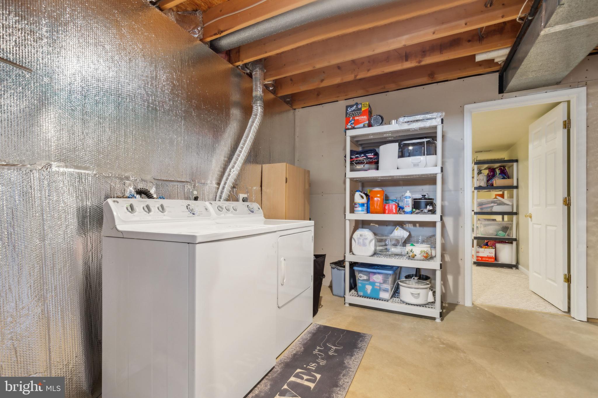 20752 Cross Timber Drive Ashburn, VA 20147 - Photo 35 of 39 a utility room with dryer and washer