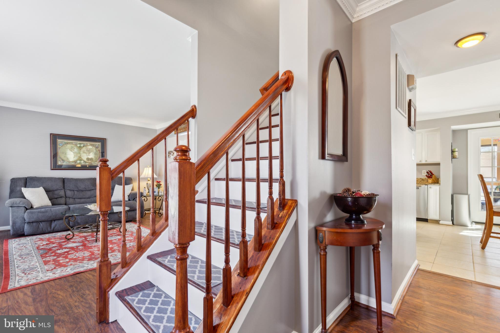 20752 Cross Timber Drive Ashburn, VA 20147 - Photo 5 of 39 a view of entryway and hall with wooden floor