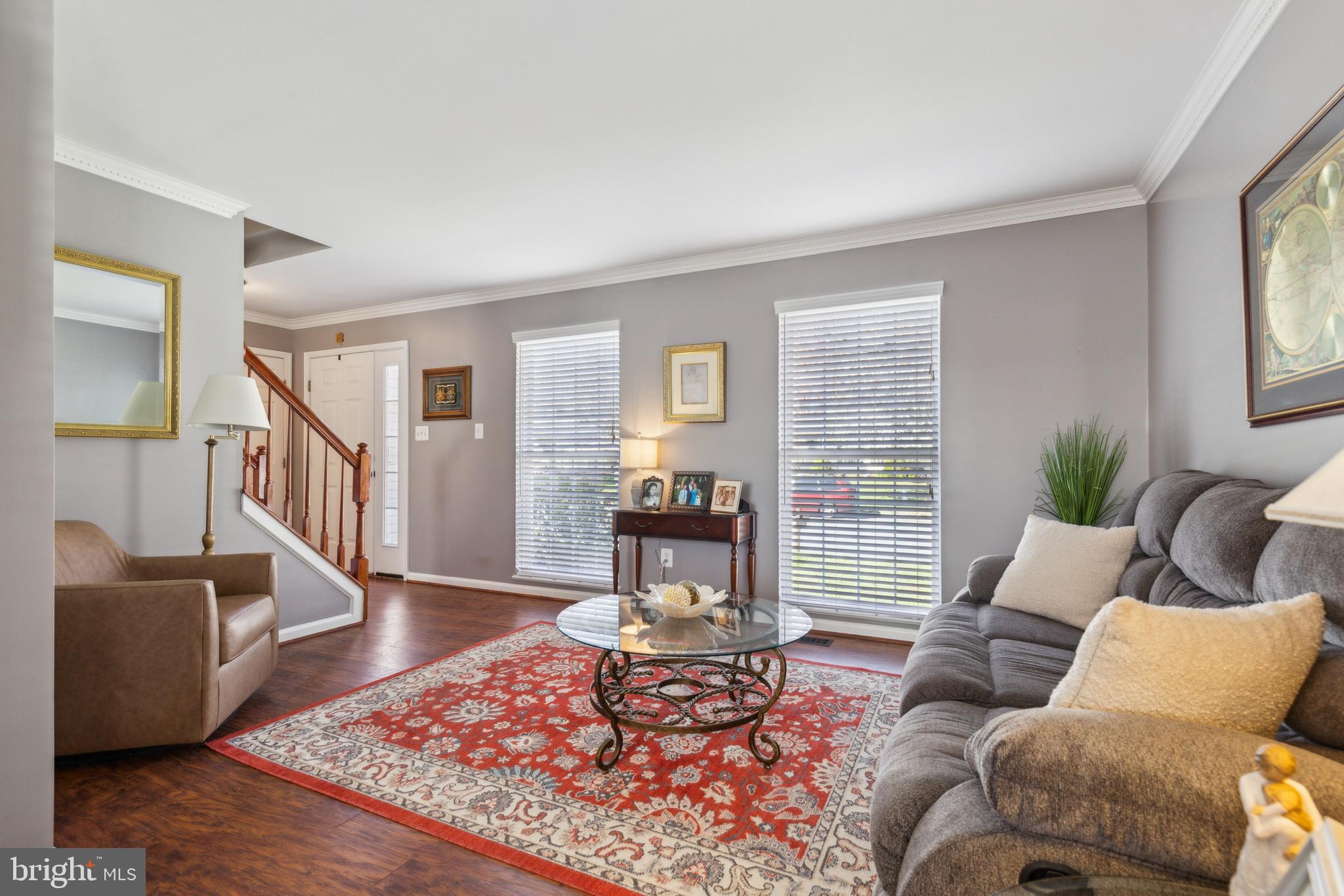 20752 Cross Timber Drive Ashburn, VA 20147 - Photo 8 of 39 a living room with furniture or couch and a wooden floor