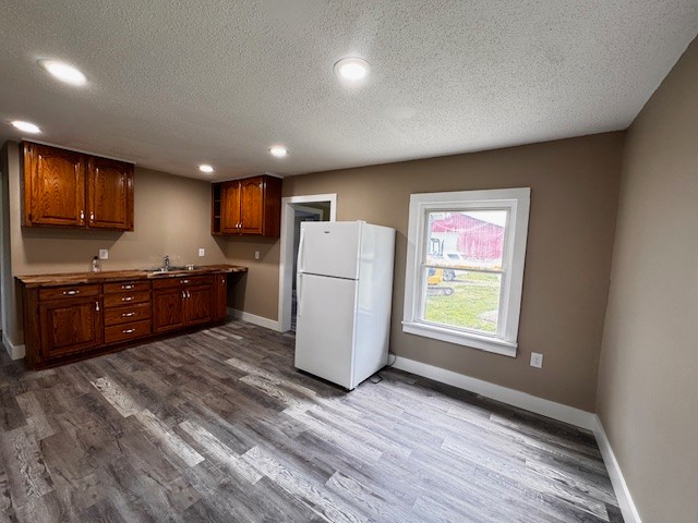 2160 Francisco Road Huntland, TN 37345 - Photo 6 of 21 a kitchen with refrigerator and microwave