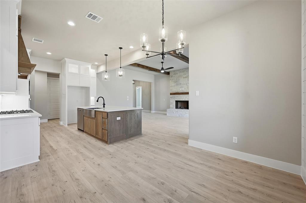 1053 Llano Way Poolville, TX 76487 - Photo 15 of 40 a view of a kitchen and a sink